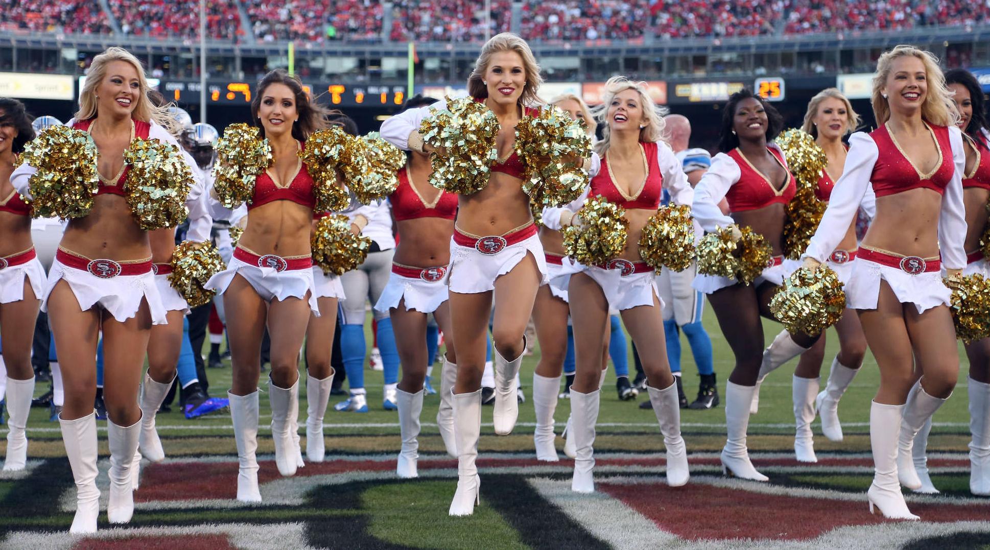 Group of Cheerleaders wearing Tan Sheer Lycra Pantyhose, Boots and White Miniskirts